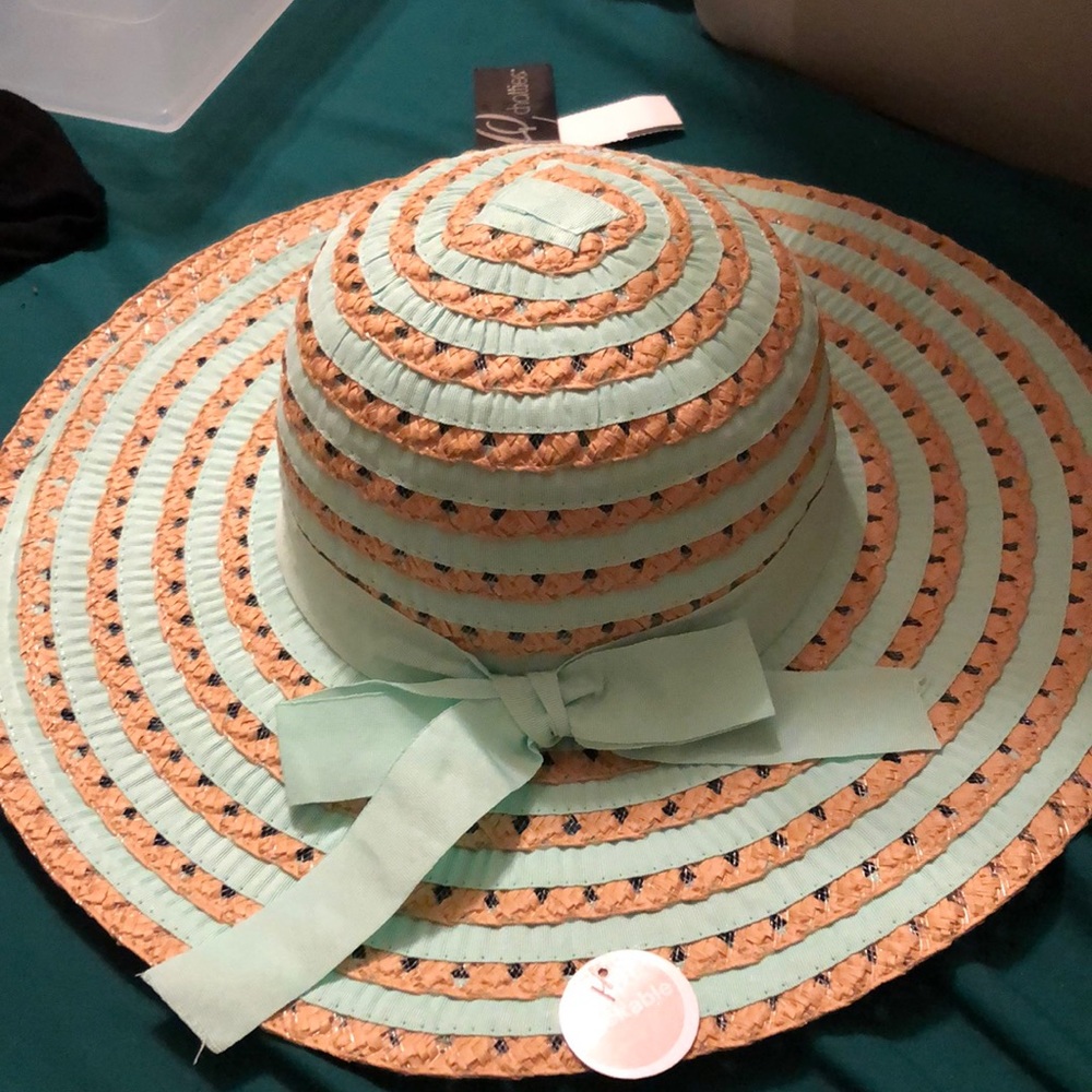 Teal and tan hat